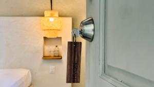 Postel nebo postele na pokoji v ubytování Hotel Noah Tulum