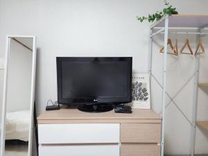 a television sitting on a dresser in a room at Dream Attic Seoul in Seoul