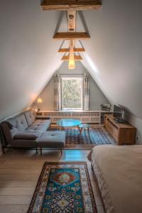 Ένα ή περισσότερα κρεβάτια σε δωμάτιο στο Villa Klara - Apartamenty Wakacyjne