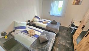 Postel nebo postele na pokoji v ubytování Ferienwohnung Sheni