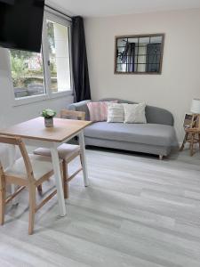 Część wypoczynkowa w obiekcie Le Badebec, Appt dans maison typique avec jardin privé