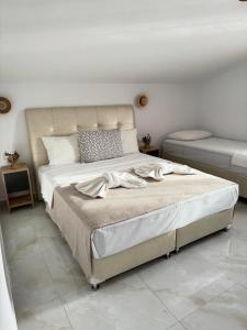 Ένα ή περισσότερα κρεβάτια σε δωμάτιο στο Eternity fresh +32 φωτογραφίες