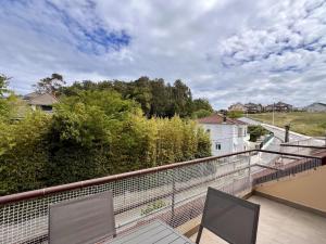 a view from the balcony of a house at Apartamento La Fuente - Monabri in Somo