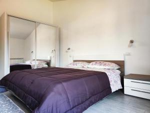 A bed or beds in a room at Domus Deiana
