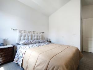 A bed or beds in a room at Domus Deiana