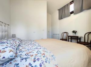 A bed or beds in a room at Domus Deiana