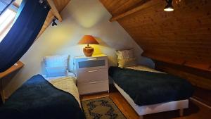 Postel nebo postele na pokoji v ubytování Gite Marie Le Bellanoy