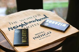 two books sitting on top of a wooden bench at Hotel Indigo York, an IHG Hotel in York