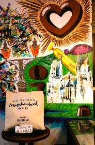 a table with a sign in front of a wall at Hotel Indigo York, an IHG Hotel in York