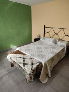 Ένα ή περισσότερα κρεβάτια σε δωμάτιο στο Casa cubos