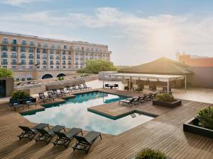 a pool on the roof of a hotel at Hyatt Regency Merida in M&eacute;rida