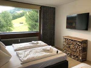 Postel nebo postele na pokoji v ubytování Appartements Domizil