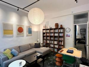 a living room with a couch and a table at 衛民家 wei min home in Tainan