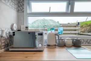 Kuchyň nebo kuchyňský kout v ubytování Adorable private couples retreat with hot tub + 34 fotografií