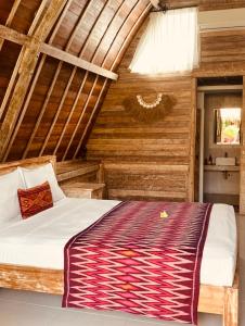 Postel nebo postele na pokoji v ubytování The Hideaway Canggu
