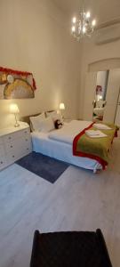 Posteľ alebo postele v izbe v ubytovaní Palace Apartment