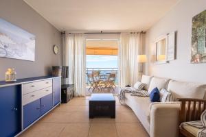 Posezení v ubytování UHC Cye Apartments