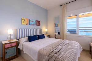 Postel nebo postele na pokoji v ubytování UHC Cye Apartments