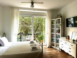 Postel nebo postele na pokoji v ubytování Adriatic Apartments
