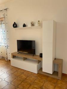 TV a/nebo společenská místnost v ubytování Ma Maison