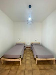 Postel nebo postele na pokoji v ubytování Ma Maison