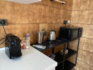 Kuchyň nebo kuchyňský kout v ubytování Ma Maison