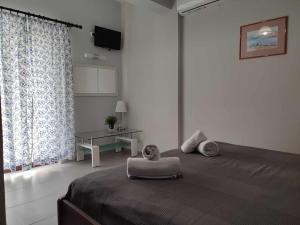 Postel nebo postele na pokoji v ubytování Posidonio Hotel