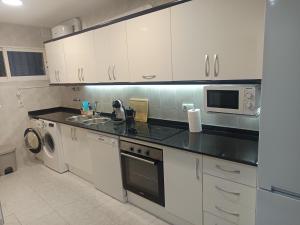 Kuchnia lub aneks kuchenny w obiekcie Delfin Home