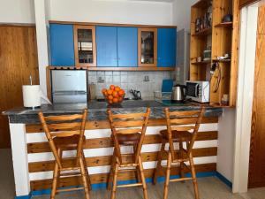 Kuchyň nebo kuchyňský kout v ubytování Atlas Apartment with Private Beach and SeaView Blue