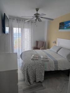 Łóżko lub łóżka w pokoju w obiekcie Delfin Home