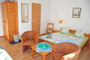 Postel nebo postele na pokoji v ubytování Pension Seeperle