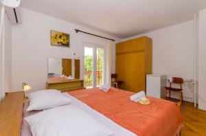 Posteľ alebo postele v izbe v ubytovaní Rooms Ante