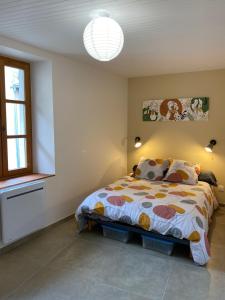 Postel nebo postele na pokoji v ubytování Le Pied de Ville Mont Guillaume