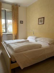 Postel nebo postele na pokoji v ubytování Albergo AQUILA