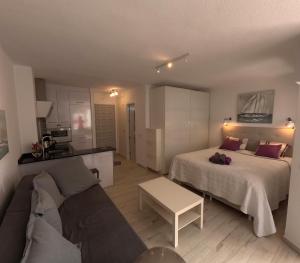 Postel nebo postele na pokoji v ubytování Estudio Torrox Beach