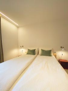 מיטה או מיטות בחדר ב-Zimmer Pradiei Dolomiti view