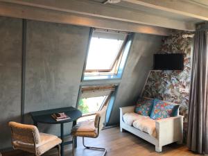 Posezení v ubytování Vakantie Studio Grou