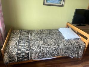 Łóżko lub łóżka w pokoju w obiekcie Hotel Motel Le Château