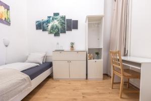 Posteľ alebo postele v izbe v ubytovaní Gellerico Rooms at Horánszky Street