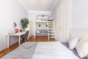 Posteľ alebo postele v izbe v ubytovaní Gellerico Rooms at Horánszky Street