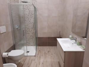 Koupelna v ubytování MARE FUORI - stanze con piscina