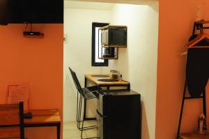 Una cocina o cocineta en Casa Don José: BUGAMBILIAS Suite