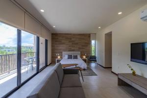 Posezení v ubytování Pool View Loft Steps From The Ocean in Punta Cocos - C101
