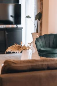 A television and/or entertainment centre at Casa D'Oro Exclusive Villa