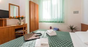 Postel nebo postele na pokoji v ubytování RESORT BAMBY