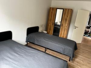 Postel nebo postele na pokoji v ubytování Apartment zum Wohlfühlen am Rande der Eifel