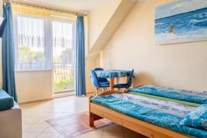 Ένα ή περισσότερα κρεβάτια σε δωμάτιο στο Majka