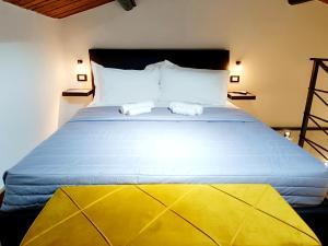 Postel nebo postele na pokoji v ubytování Ti Scialìi Loft + 22 fotografií