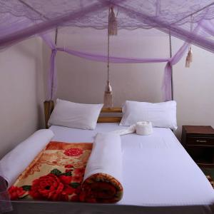Voodi või voodid majutusasutuse Sipi Guest House toas