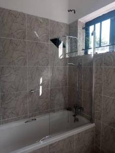 Ένα μπάνιο στο Genesis Guesthouse